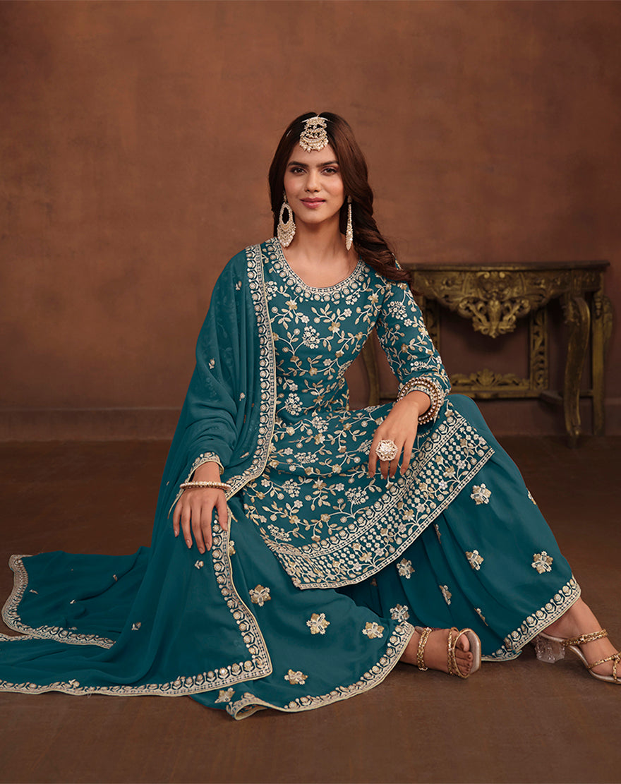 Teal Blue Faux Georgette Embelished Salwar Kameez - Monjolika Fashion Teal Blue Faux Georgette Embelished Salwar Kameez - Monjolika Fashion