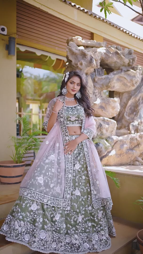 Green Tissue Heavy Work Engagement Wear Lehenga Choli Green Tissue Heavy Work Engagement Wear Lehenga Choli