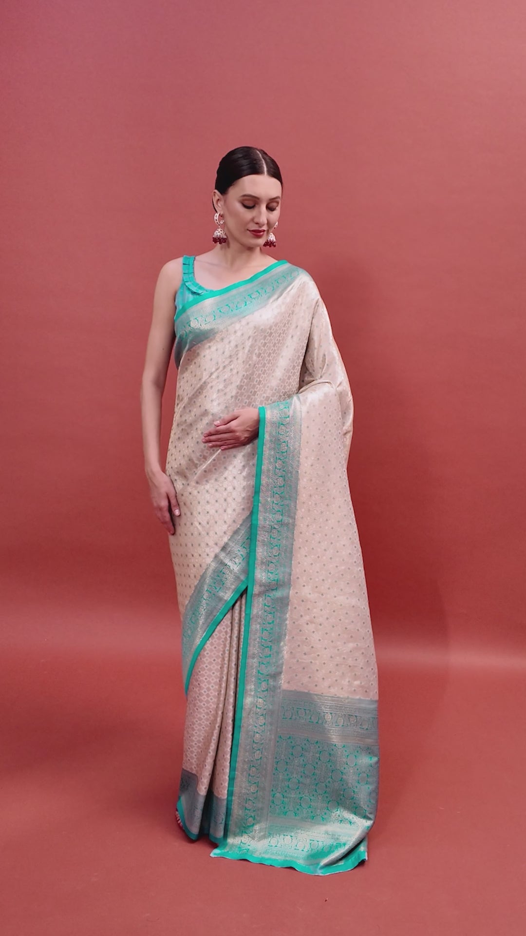 Off White & Turquoise Kanjivaram Silk Zari Woven Festive Wear Saree Off White & Turquoise Kanjivaram Silk Zari Woven Festive Wear Saree