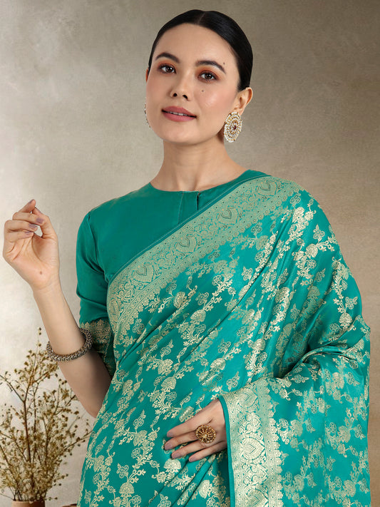 Effervescent Turquoise Soft Banarasi Satin Silk Saree With Elision Blouse Piece