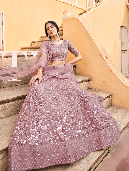 Mauve Color Net Zarkhan Work Heavy Lehenga Choli