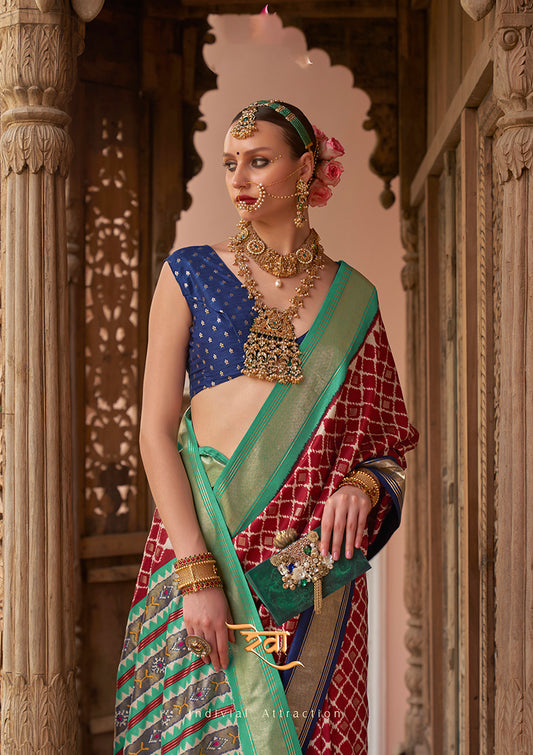 Red Patola Silk Zari Weaving Work Saree With Contrast Blouse