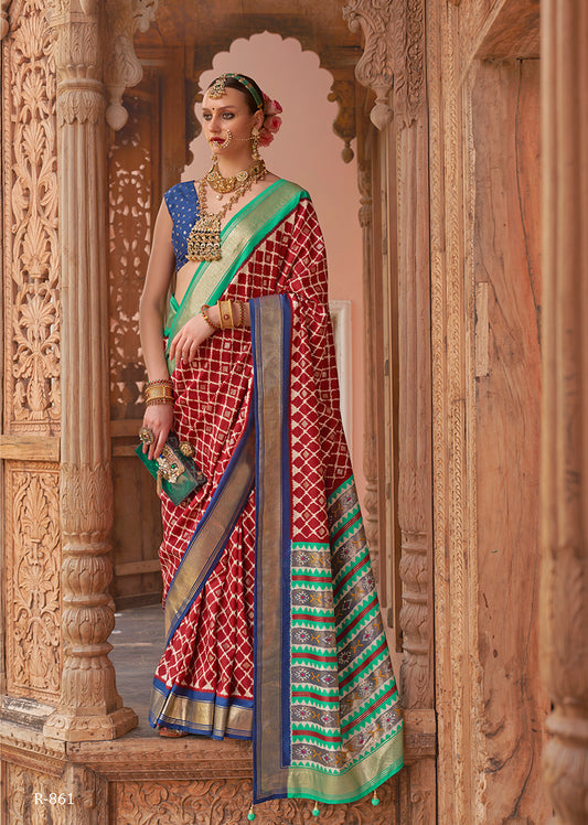 Red Patola Silk Zari Weaving Work Saree With Contrast Blouse