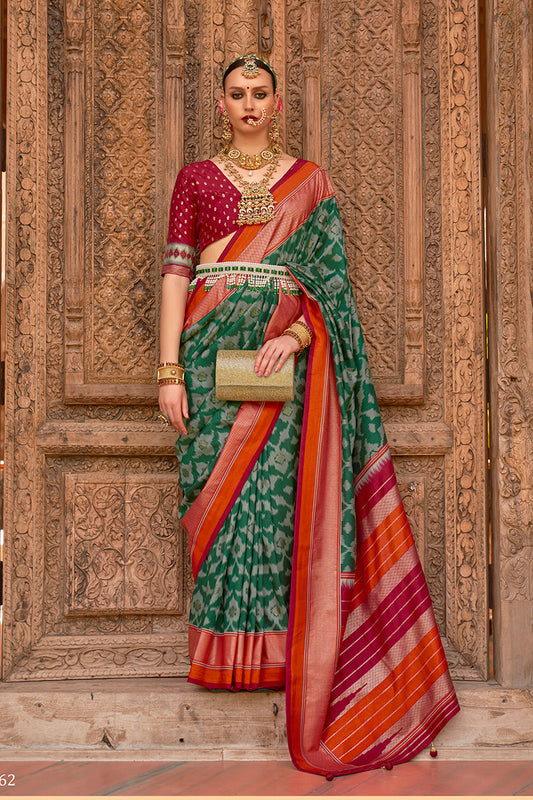 Green Patola Silk Zari Weaving Work Saree With Contrast Blouse