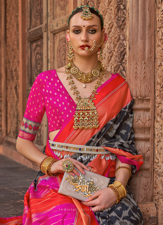Black Patola Silk Zari Weaving Work Saree With Contrast Blouse
