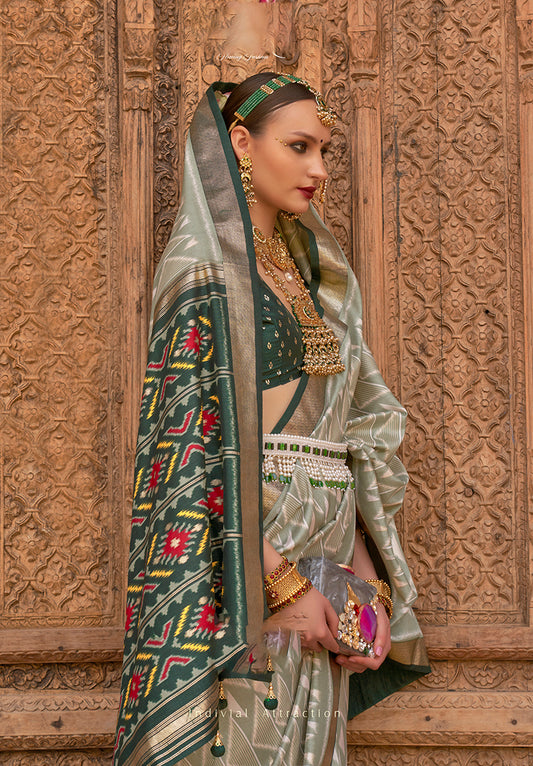 Light Green Patola Silk Zari Weaving Work Saree With Contrast Blouse