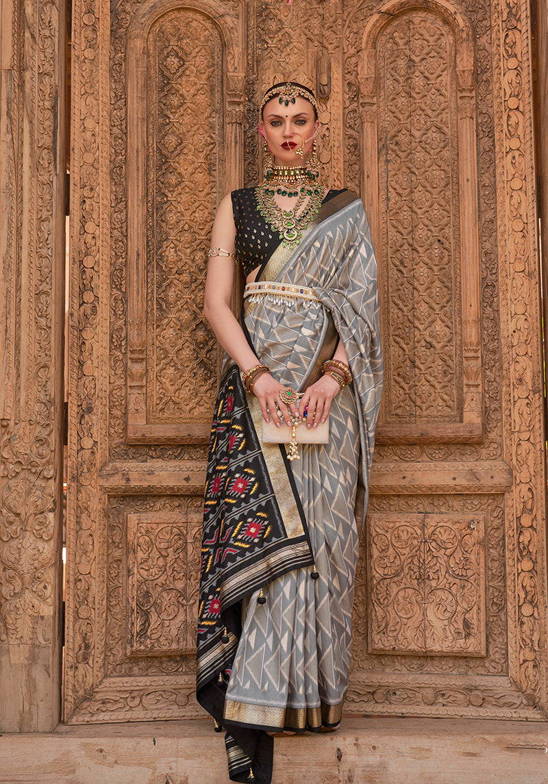Gray Patola Silk Zari Weaving Work Saree With Contrast Blouse