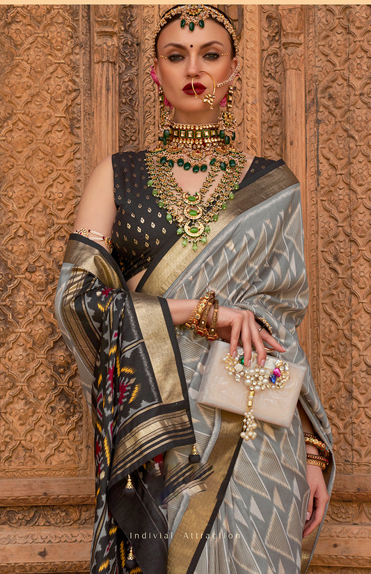 Gray Patola Silk Zari Weaving Work Saree With Contrast Blouse