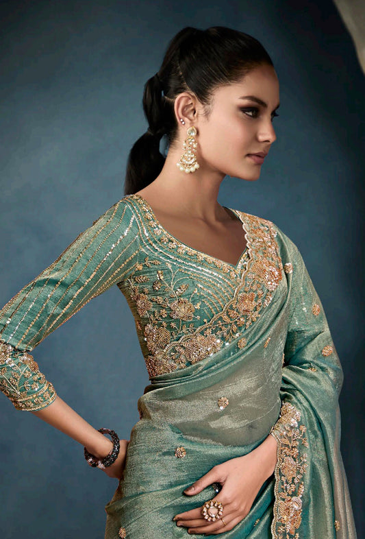 Light Teal Tissue Silk Saree Featuring Intricate Cutdana Work