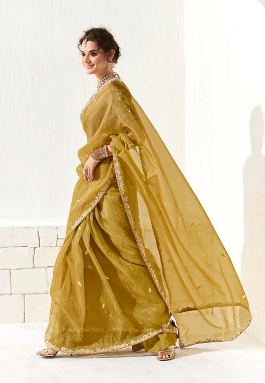 Mustard Tissue Silk Saree Featuring Intricate Sequins Work