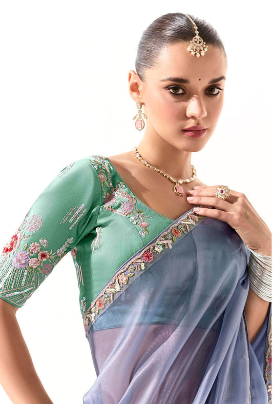 Light Lavender Tissue Silk Saree Featuring Intricate Sequins Work
