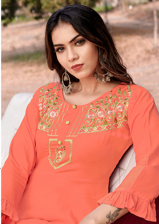 Gorgeous Peach Rayon Embroidered Designer Kurti