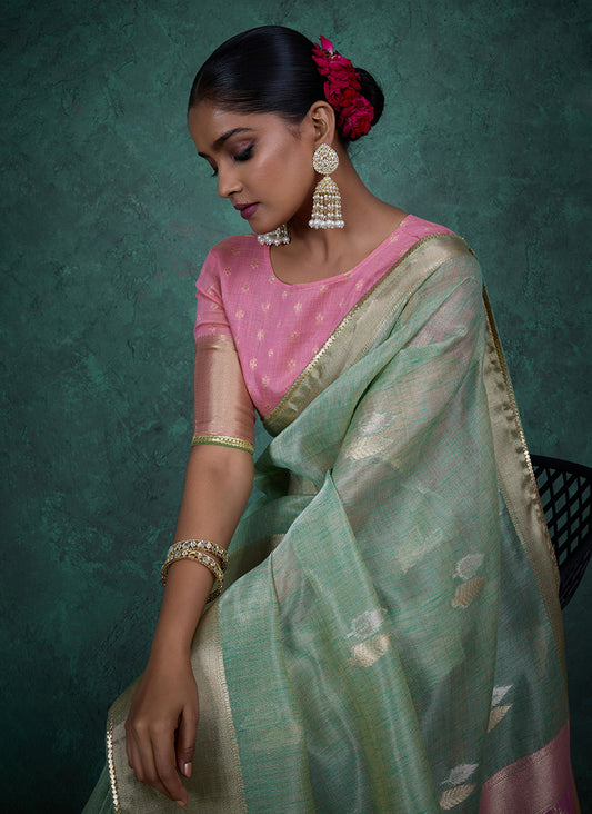 A glam Light blue Linen blend Woven Sequince Work Saree