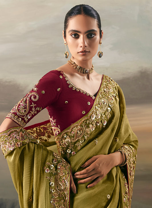 Olive Elegant Party And Wedding Wear Tissue Saree With Designer Contrast Hand Work Blouse