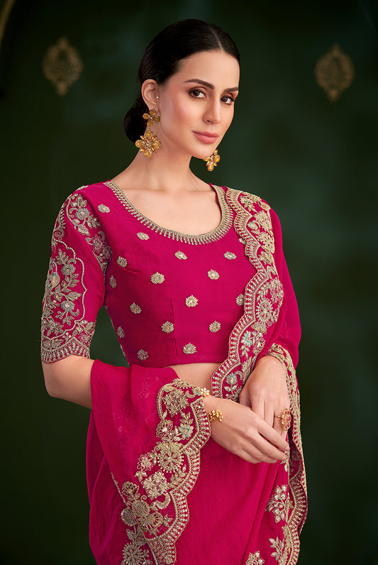 Rani Pink Color Shining Silk Georgette Saree With Heavy Work Blouse