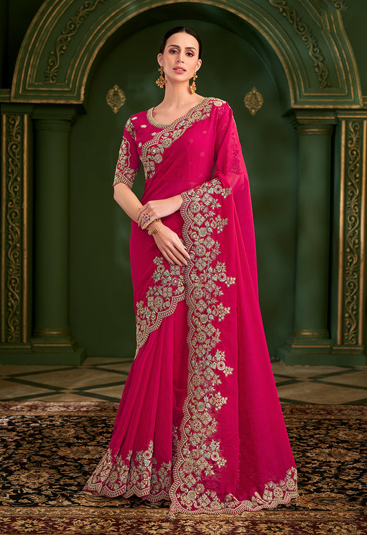 Rani Pink Color Shining Silk Georgette Saree With Heavy Work Blouse